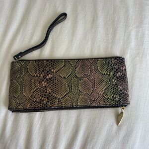 Hobo wristlet wallet in rainbow snake print with purple inside